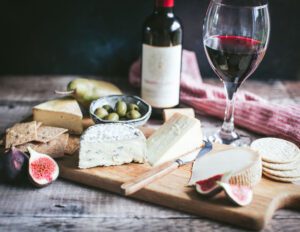 cookies, bread and wine on table